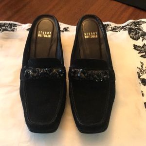 Black suede Stuart Weitzman sling backs.